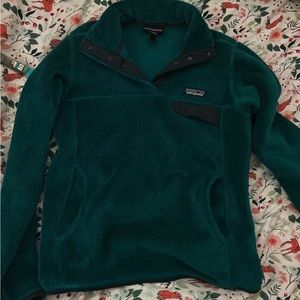 Patagonia turquoise fleece pullover with front pocket size xs